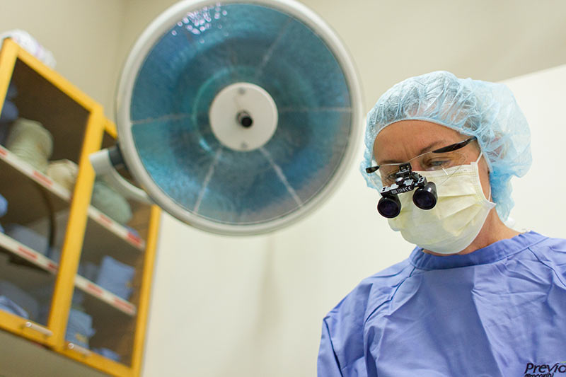 Dr Champion performing sergery.